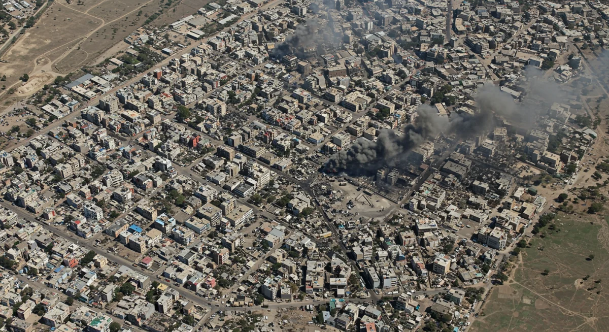 Urban conflict zone depicting humanitarian and security challenges